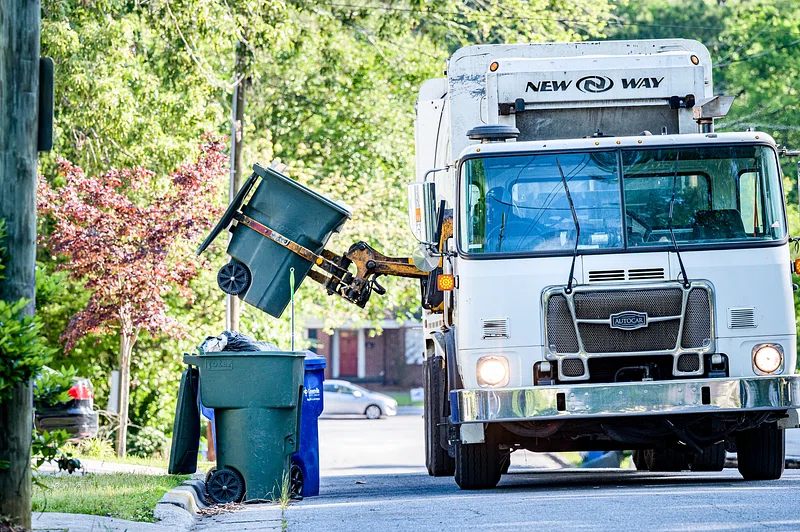 Waste collection truck on a residential route
